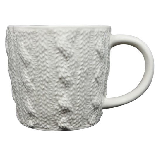 Starbucks cable knit mug in white ceramic with a textured knit pattern for cozy beverages