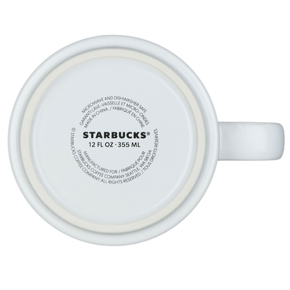Bottom view of the collectible Starbucks subway tile mug showcasing care instructions and mug details
