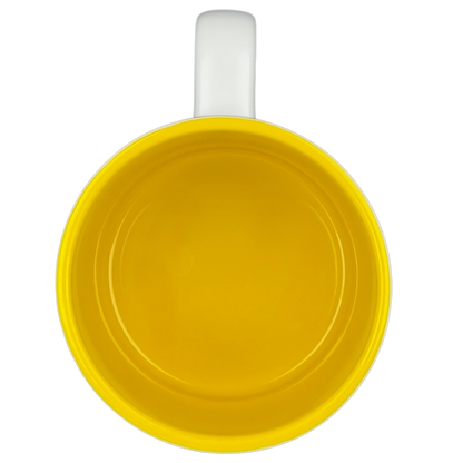 Inside view of a collectible Starbucks subway tile mug featuring a bright yellow color