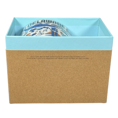 Starbucks Delaware Been There mug partially visible inside a blue and brown gift box