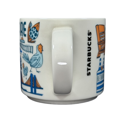 Starbucks Delaware Been There mug showing side handle and colorful state-themed illustrations