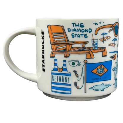Starbucks Delaware Been There mug featuring state-themed illustrations and the Starbucks logo on the handle