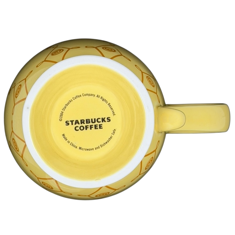 Top view of a Diamond Swirl Yellow Mug Starbucks featuring a bright yellow design with logo