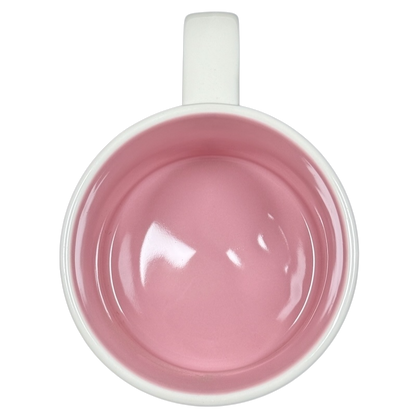 Top view of empty Disneyland Starbucks Been There Series mug with pink interior and white handle