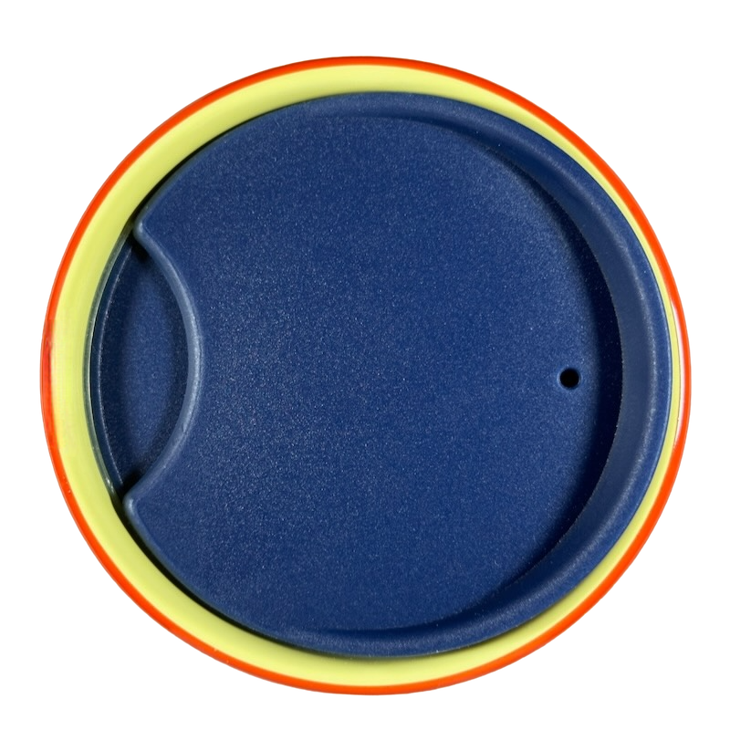 Top view of blue lid for Disneyland Minnie Mouse Starbucks tumbler with yellow and orange rim