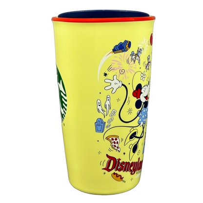 Disneyland Minnie Mouse Starbucks tumbler with yellow body and colorful cartoon design
