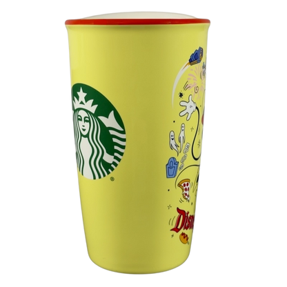 Yellow Disneyland Minnie Mouse Starbucks tumbler with red rim and green Starbucks logo