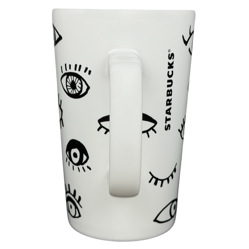 Starbucks Dot Collection Eyes mug with unique black eye designs on a white background