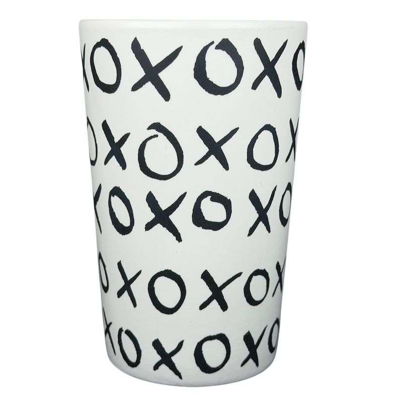 Dot collection Starbucks XOXO collectible mug featuring playful black and white XOXO patterns