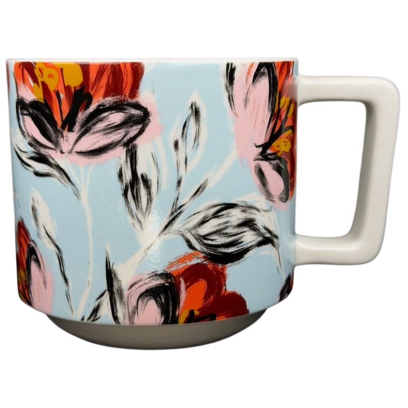 Starbucks floral abstract mug featuring vibrant floral patterns on a light blue background