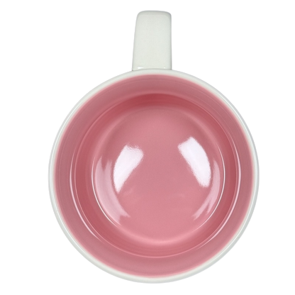 Top view of a Starbucks Florida Been There mug showing pink interior and white handle