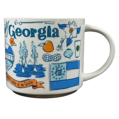 Starbucks Georgia Been There Series mug featuring state landmarks and symbols in blue and orange design