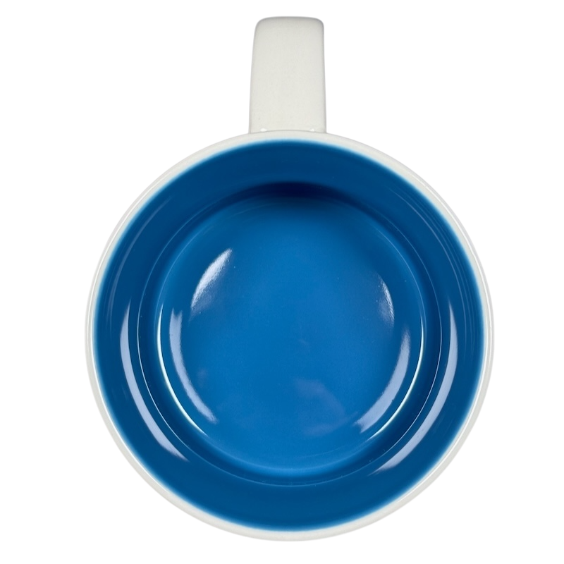Top view of Starbucks Georgia Been There Series mug with vibrant blue interior and white handle
