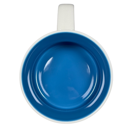 Top view of Starbucks Georgia Been There Series mug with vibrant blue interior and white handle