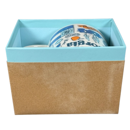 Starbucks Georgia Been There Series mug partially visible inside blue and brown gift box