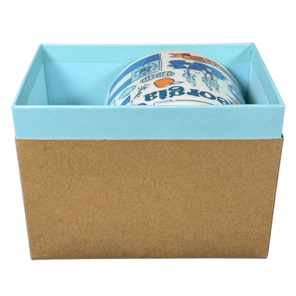 Starbucks Georgia Been There Series mug partially visible inside light blue and brown gift box