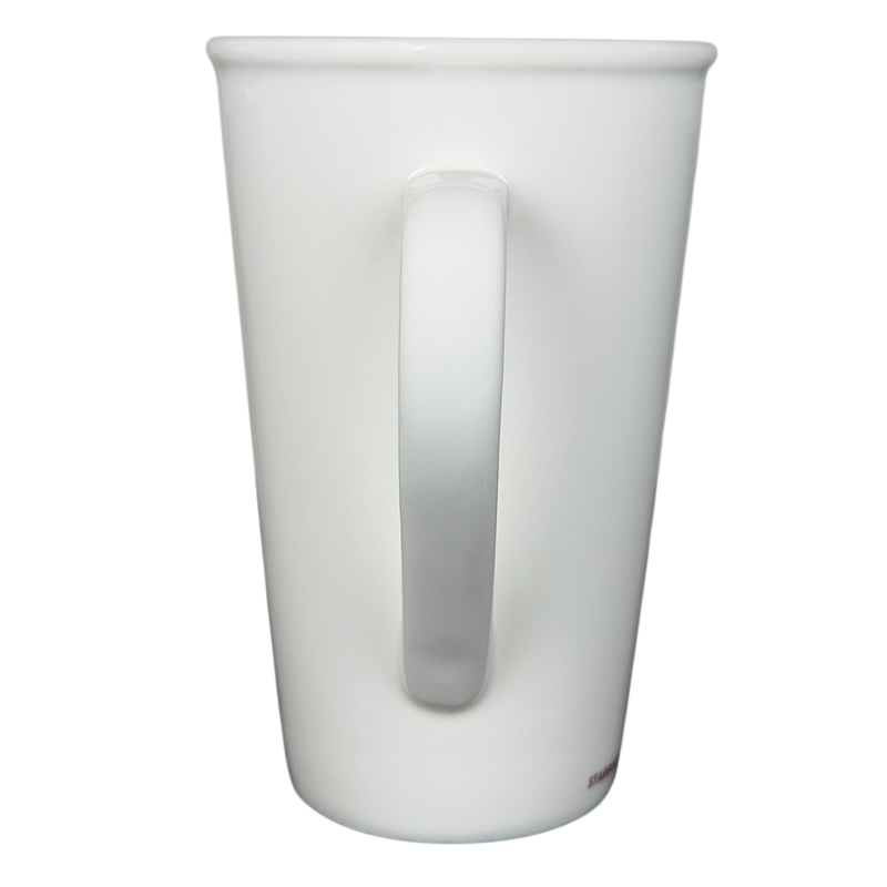 Starbucks grande vintage mug in white ceramic with a sleek design and comfortable handle