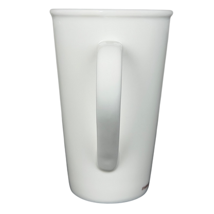 Starbucks grande vintage mug in white ceramic with a sleek design and comfortable handle