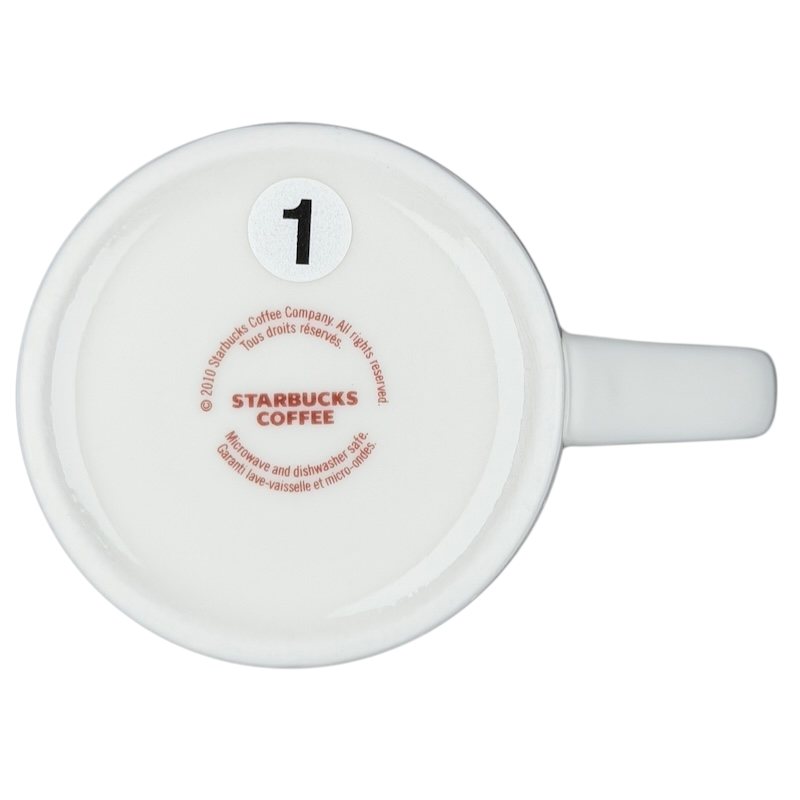 Bottom view of a Starbucks grande vintage mug showcasing brand details and number
