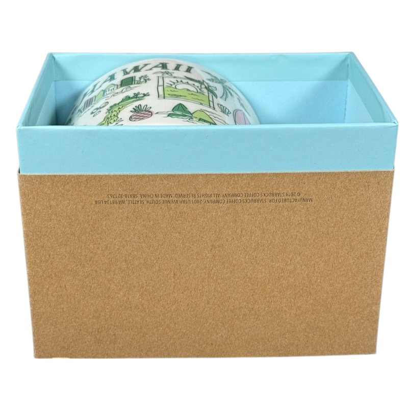 Starbucks Hawaii Been There mug partially visible inside blue and brown gift box