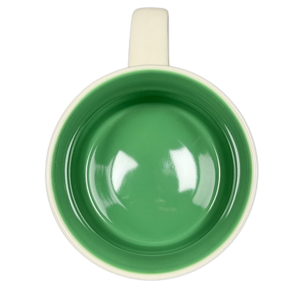 Top view of empty Starbucks Hawaii Been There mug with green interior and white handle