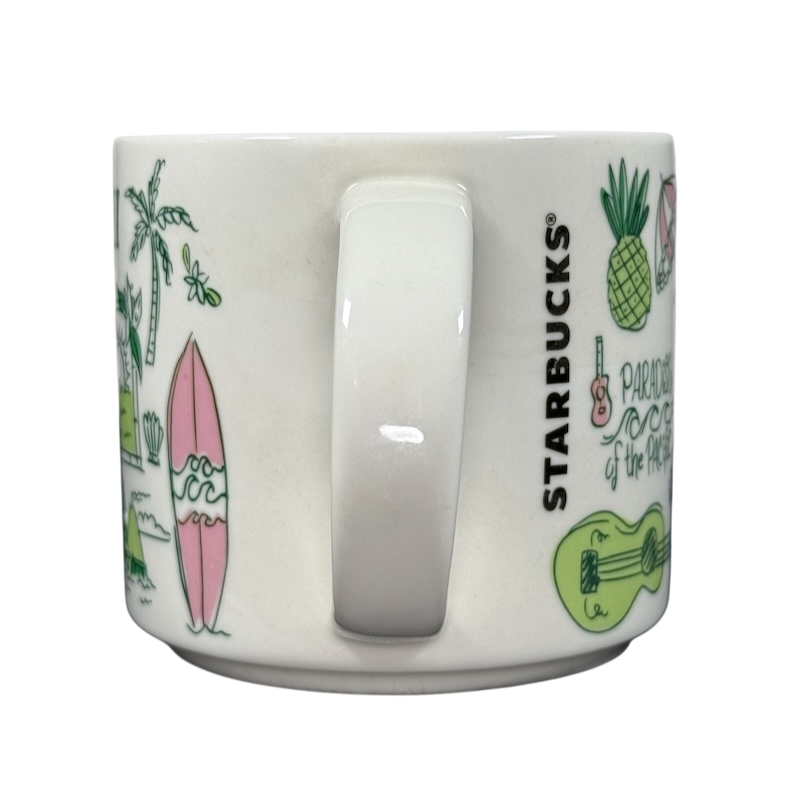 White Starbucks Hawaii Been There mug with tropical designs including palm trees, surfboard, pineapple, and ukulele