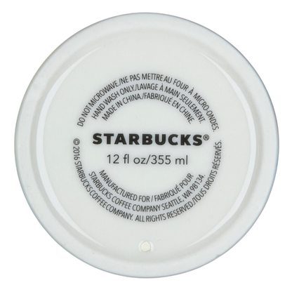 Bottom view of Starbucks Hawaii siren tumbler with care instructions and capacity details