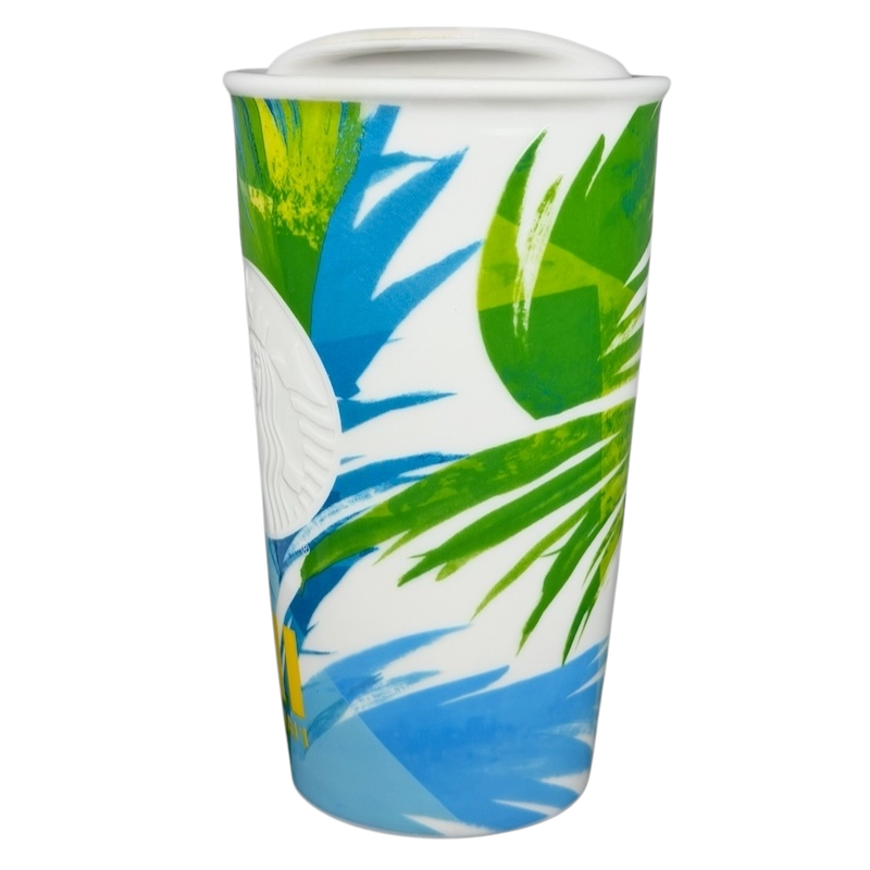 Starbucks Hawaii siren tumbler featuring vibrant tropical design with palm leaves and ocean colors