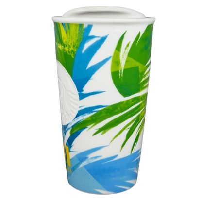 Starbucks Hawaii siren tumbler featuring vibrant tropical design with palm leaves and ocean colors