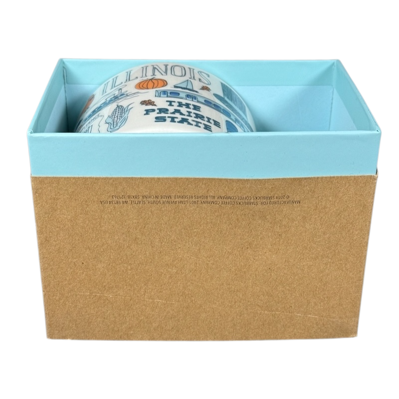 Illinois Starbucks Been There mug partially visible inside light blue and brown packaging box