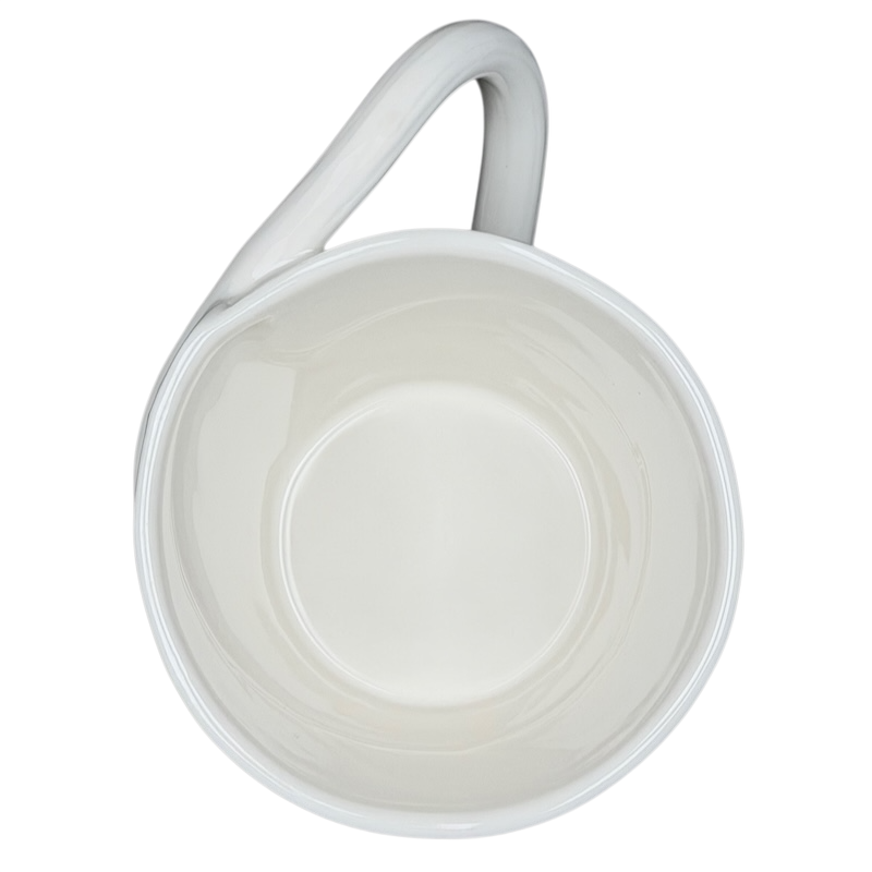 Starbucks leaf mug with a smooth white interior and a curved handle for comfortable sipping