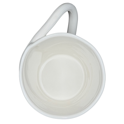 Starbucks leaf mug with a smooth white interior and a curved handle for comfortable sipping