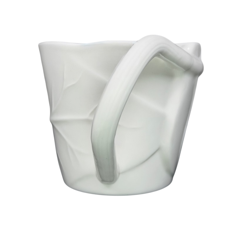 Starbucks leaf mug in white with a textured leaf design and a curved handle