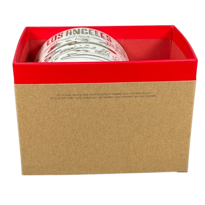 Starbucks Los Angeles holiday Been There Series mug partially visible in red and brown gift box