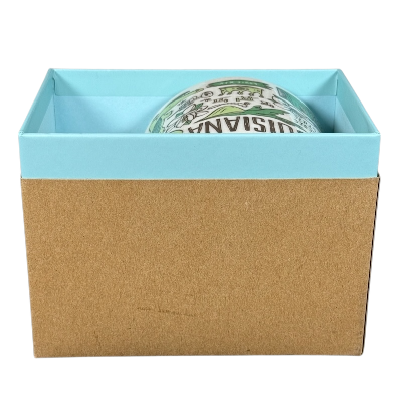 Starbucks Louisiana Been There mug partially visible inside blue and brown gift box