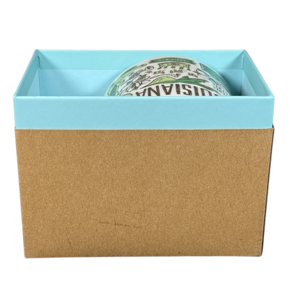 Starbucks Louisiana Been There mug partially visible inside blue and brown gift box