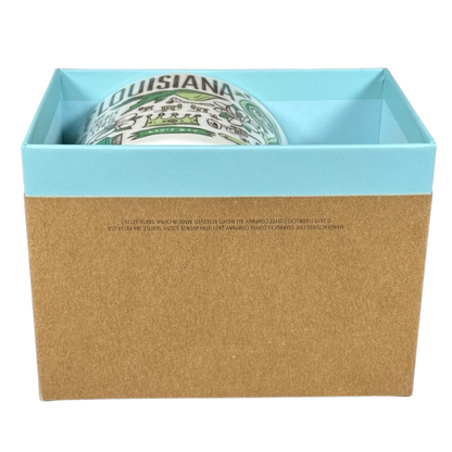 Starbucks Louisiana Been There mug partially visible in blue and brown gift box