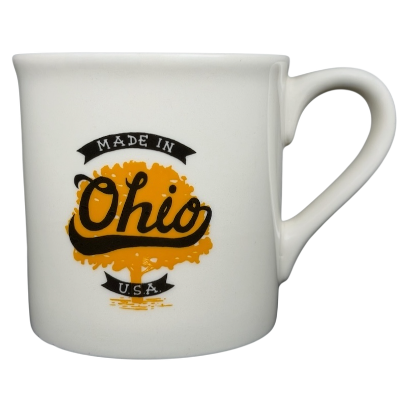 Ceramic Starbucks mug with 'Made in Ohio' design and vibrant yellow tree graphic