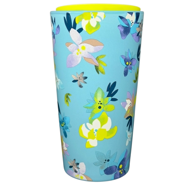 Starbucks Magnolia Flowers Blue Tumbler featuring a colorful floral design on a light blue background