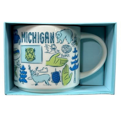 Starbucks Michigan Been There mug featuring state-themed illustrations in blue and green colors