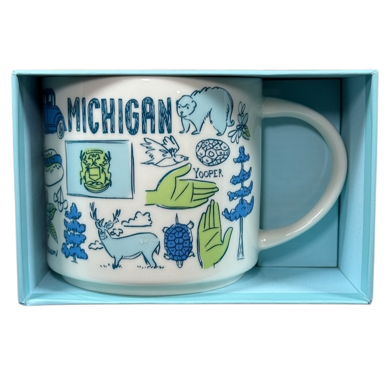 Starbucks Michigan Been There mug featuring state-themed illustrations in blue and green in a light blue box