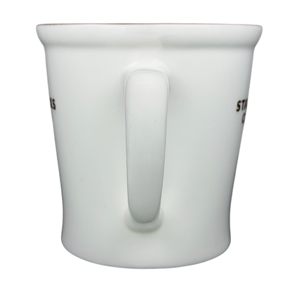 New Bone China Brown Interior 2009 Starbucks Mug with a sleek design and sturdy handle
