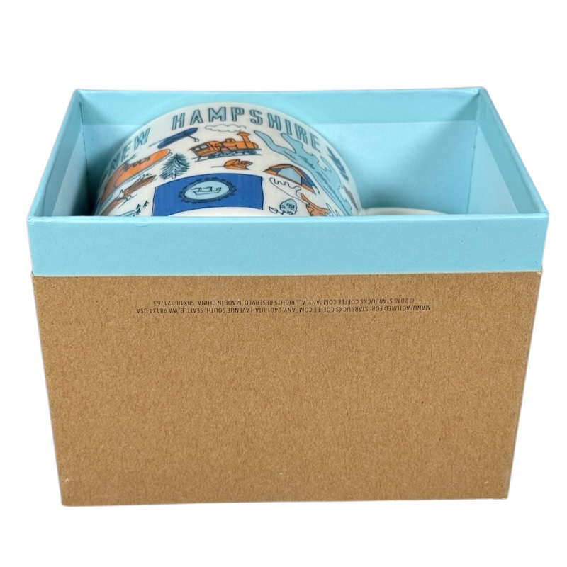 Starbucks New Hampshire Been There mug partially inside light blue and brown gift box