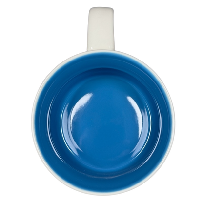 Top view of Starbucks New Hampshire Been There mug with blue interior and white handle on black background