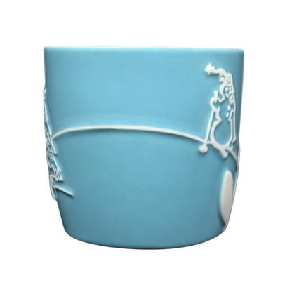 Starbucks penguin snowman skiing vintage mug in light blue with unique embossed design