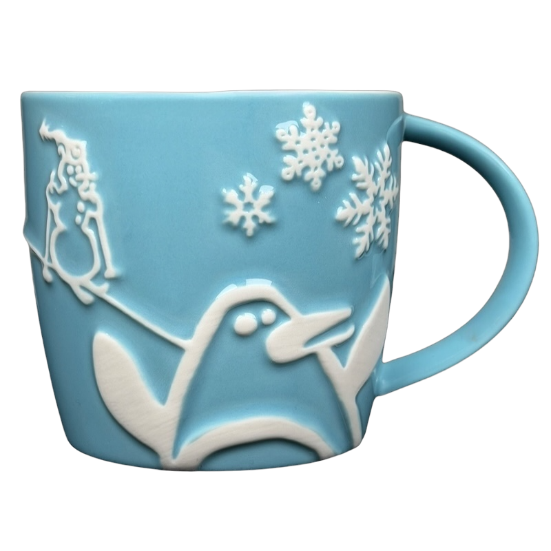 Starbucks penguin snowman skiing vintage mug in light blue with embossed design and snowflakes