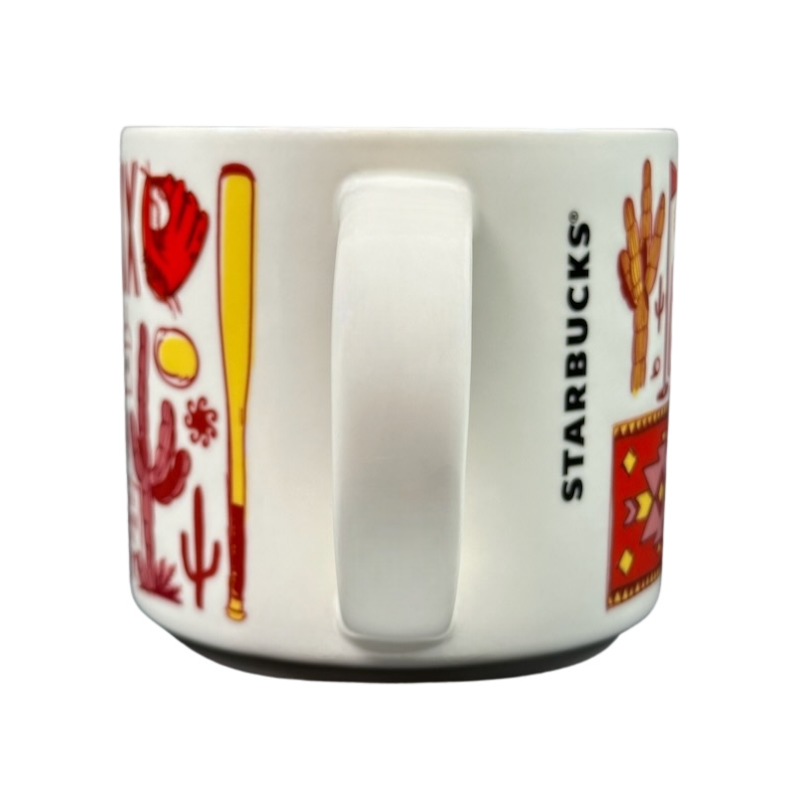 Side view of Starbucks Phoenix Been There mug featuring red and yellow Southwestern designs with white handle