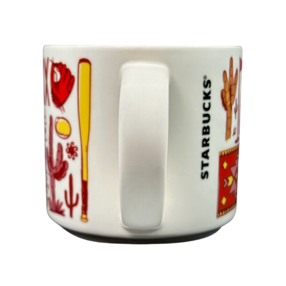 Side view of Starbucks Phoenix Been There mug featuring red and yellow Southwestern designs with white handle