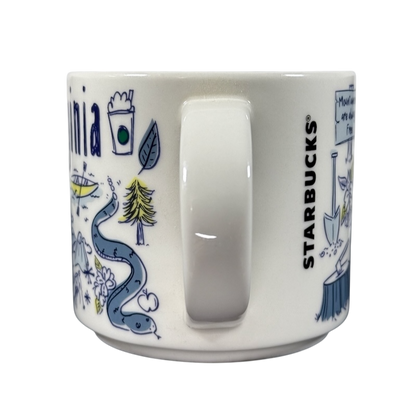 Rare Starbucks 2019 West Virginia mug featuring illustrated state landmarks and Starbucks logo
