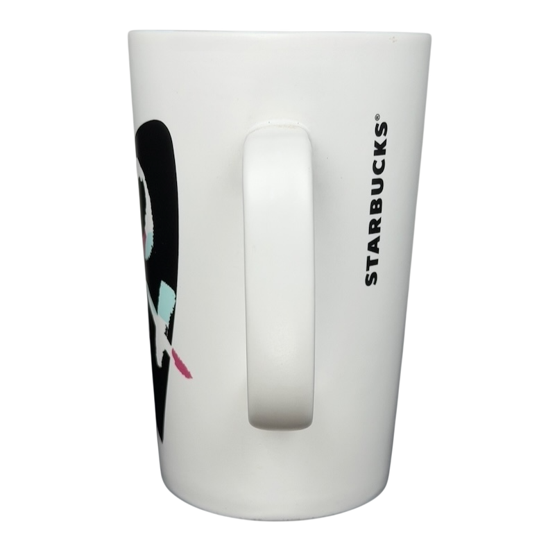 Rare Starbucks XOXO mug featuring a sleek design and comfortable handle for coffee lovers
